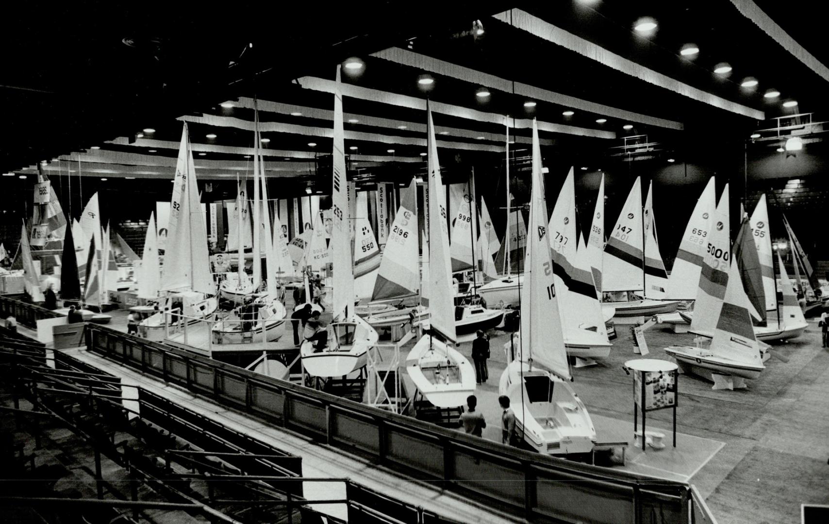 They're landlocked now, but sleek boats at the Coliseum show are making many sailors dream of summer breezes