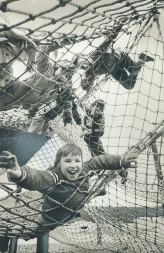 Widely imitated: The highly imaginative equipment at Children's Village, such as this rope climb, is a big hit with kids