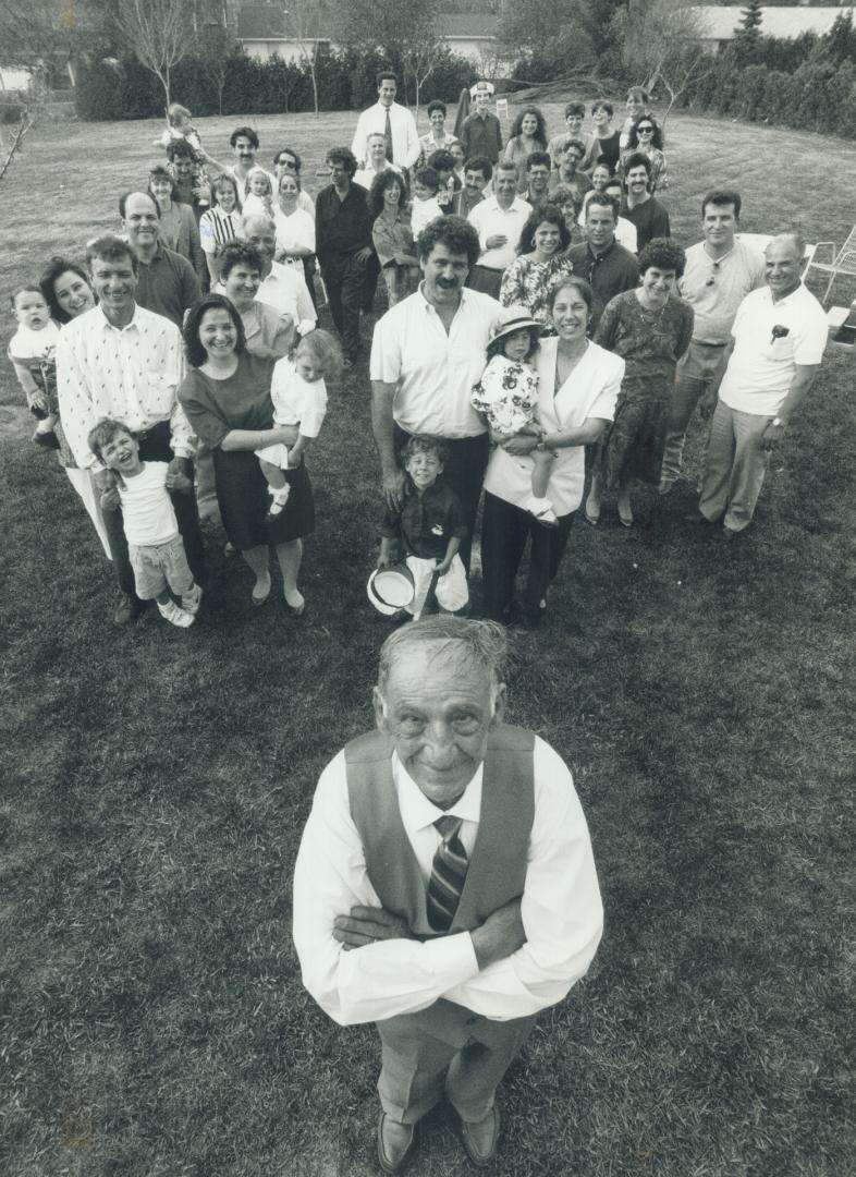 Extended Family: Flore Furgluele, 85, joins his eight children and a bountiful harvest of grandchildren and great-grandchildren for a scrumptious Sunday picnic most weeks