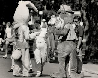 A kids' place: Huggy the Bear and Joey the Kangaroo greet visitors to the CNE yesterday during Kids' Day at the fair