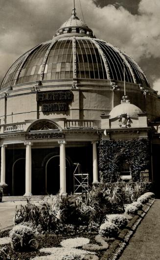 Clouds set off the glass dome of the Horticultural buildings at the Canadian National Exhibition