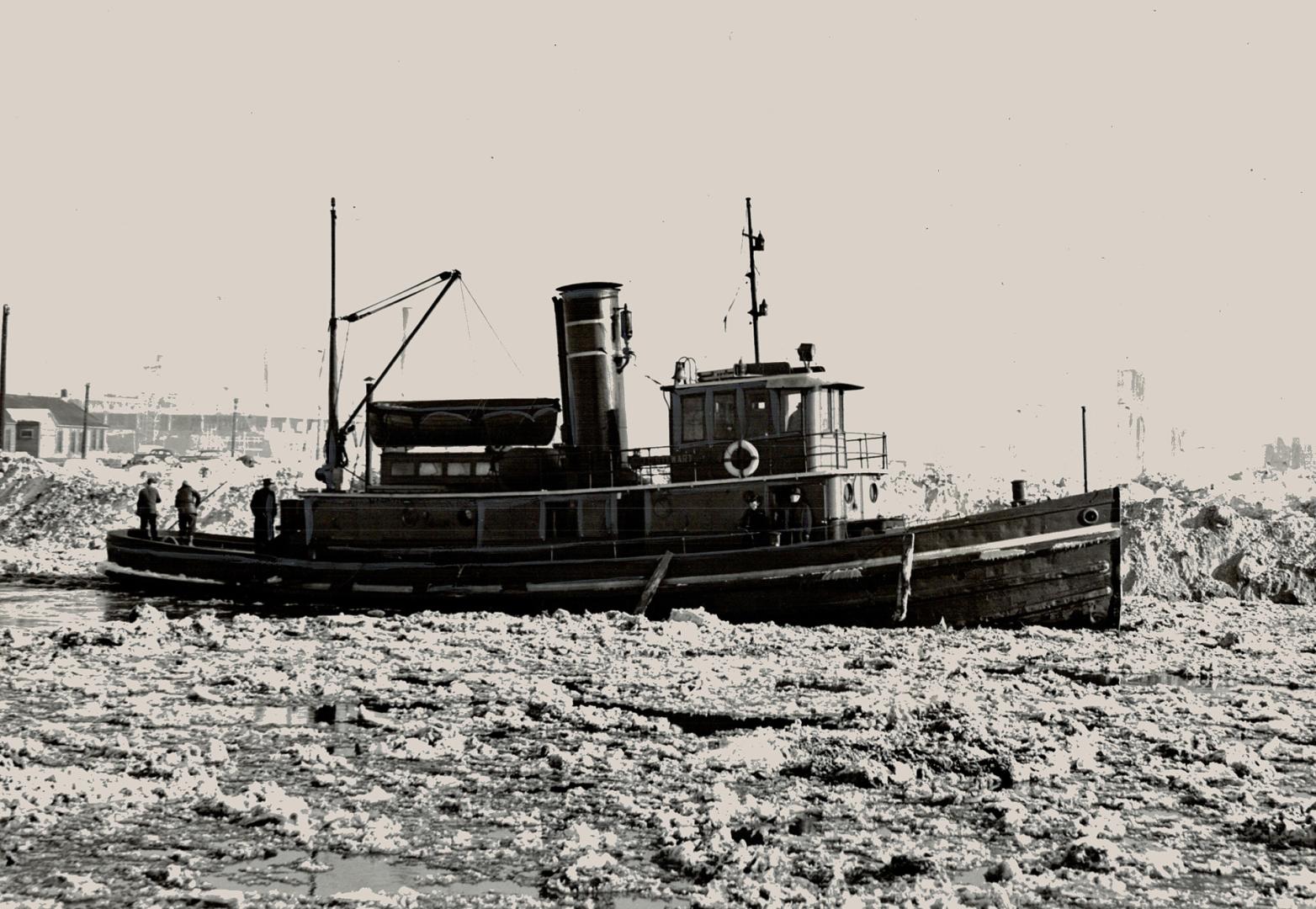 This is one of the tugs which operate through ice in Toronto bay, taking island residents to and from city during winter months