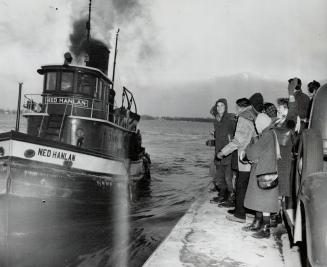 Waiting for the tug to take them to the city and their jobs, these Islanders tell the world that they are citizens of Toronto, too, and need help.