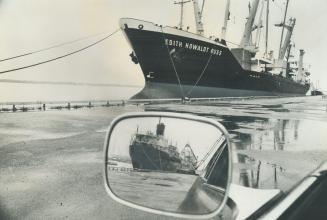 Image shows a huge ship on the lake.