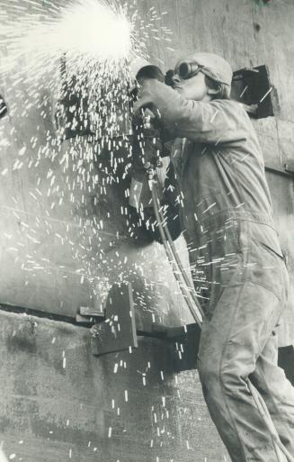 Image shows a Harbour construction worker.