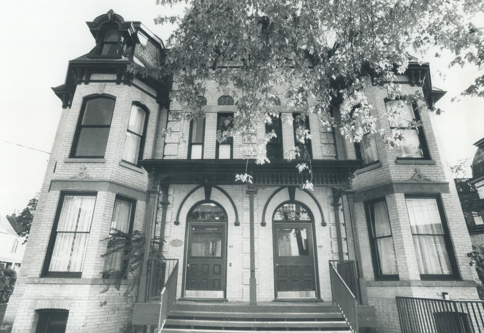 The semi-detached house on the left, 147 Beverley St