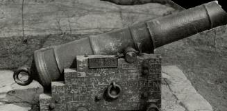 This old gun resting near the stone bridge over the Humber at Bloor street, Toronto saw service at the battle of Waterloo in 1815