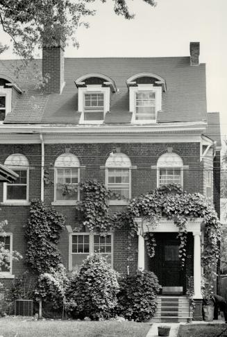 Right, a rare row of Colonial Revival houses, circa 1900, graces Howland Ave