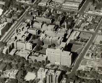 Stretched out below this friendly pilot is Toronto's General hospital