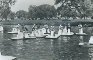 Toronto island lagoon with its paddle boats is a mecca for young mariners on bright, warm days