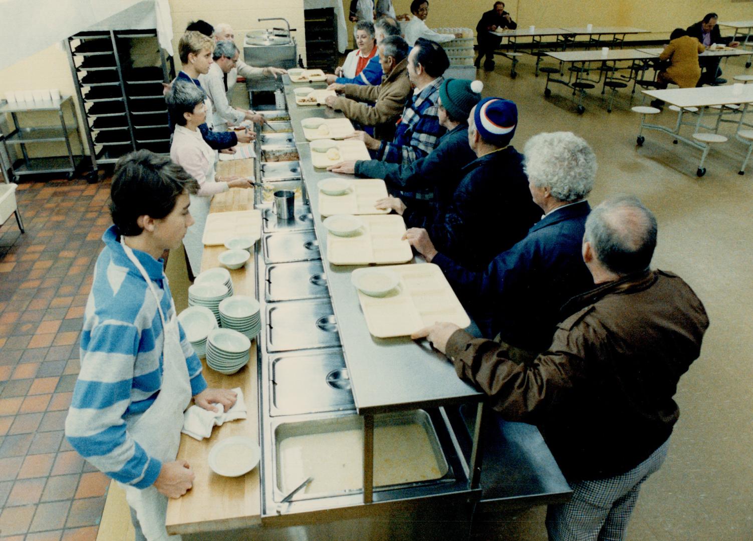 Hopeful haven: Brother Timothy, right, is one who lays it on the line by trying to help feed the poor and temporarily shelter the homeless in Metro at the refuge on Queen Street East