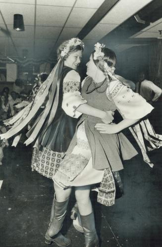 Members of the Ukrainian church take part in a dance in the Odessa pavilion during Caravan 74, Caravan 74 is one of the nicest things the city has don(...)