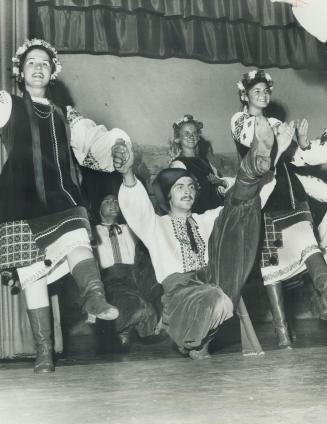 Dancers kick up their heels at the Kyiv pavilion, one of 50 in this year's Caravan