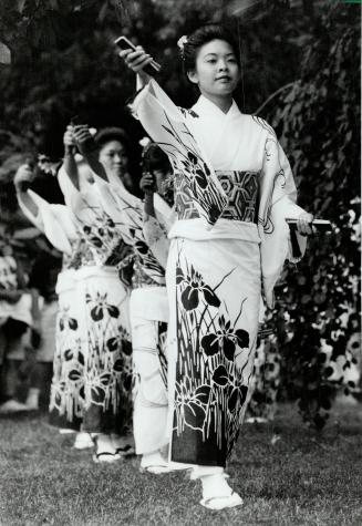 Flowering kimonos: Members of the Ayame Kai Dance Group perform a traditional Japanese dance called Odori yesterday at the Tokyo Pavilion