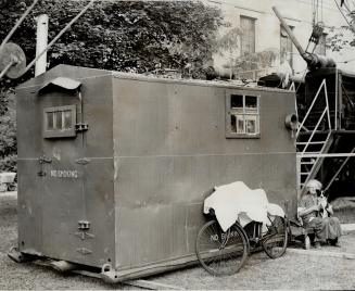 Evicted from Stanley Barracks by the city, family of Archibald Widdowson was given shelter last night in this tool hut near C.N.E. Princes Gate by a v(...)