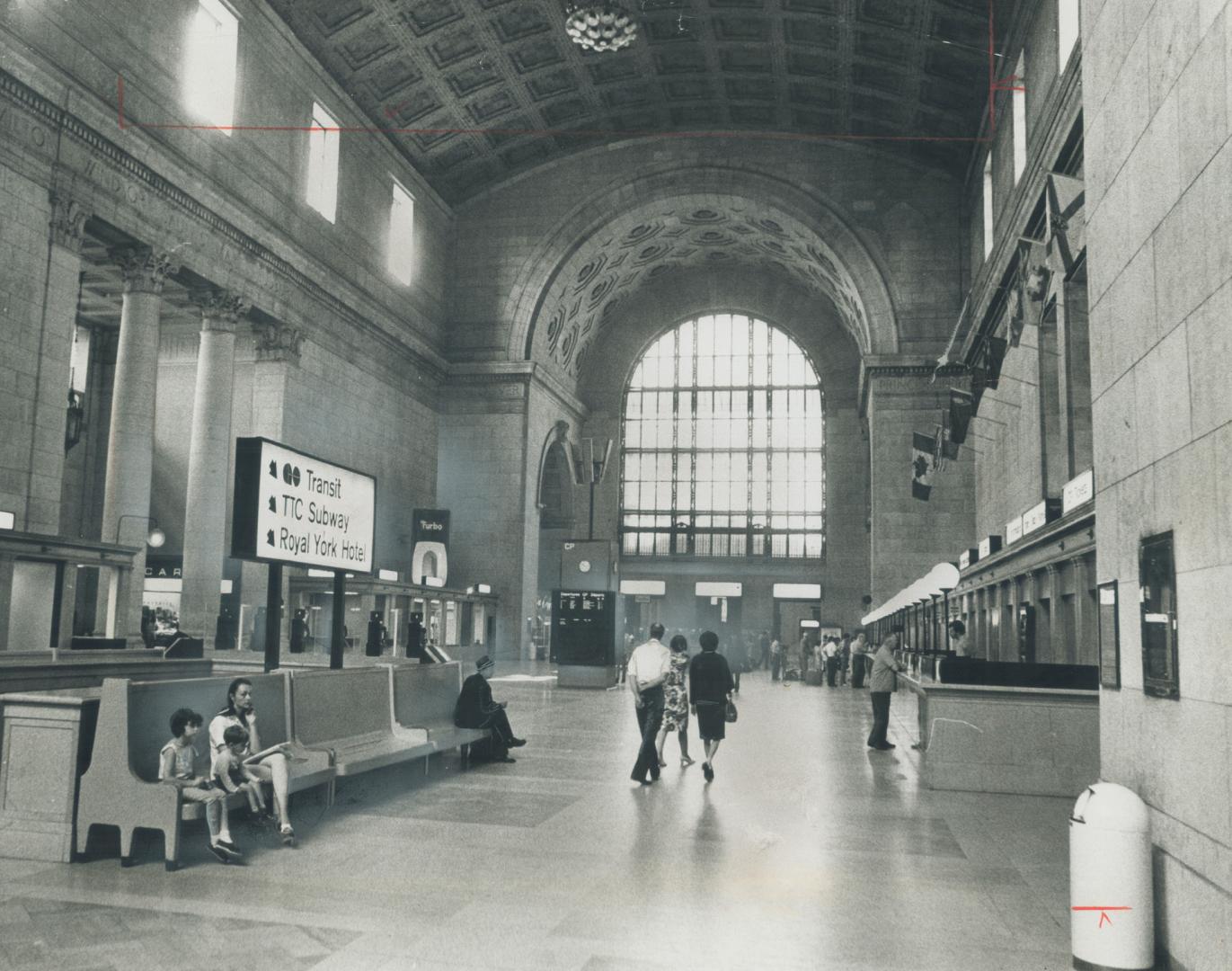 Thousands of commuters transfer daily from GO trains to the subway at Union Station (above)