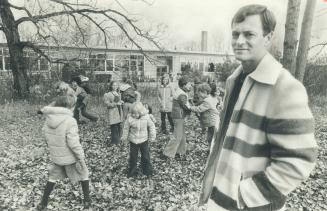 Principal E. A. (Ted) Currie outside school on Toronto Islands