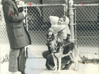 A goodby hug. This poignant photograph of a blind mother hugging her child goodby as she leaves the child at Margaret Feltcher Day Care Centre was taken by Star phtographer John Mahler