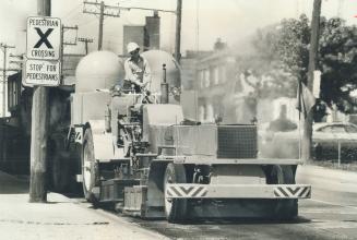 Talk about your hotrods . . . ! What is believed to be the world's largest heater-planer for re-levelling asphalt road surfaces started work this week(...)