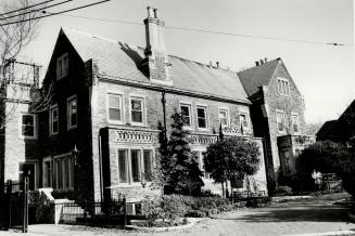 Image shows a three storey residential house.