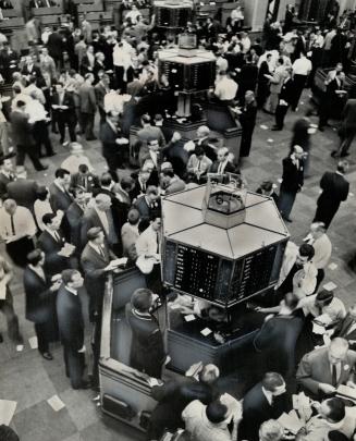 Traders crowd Toronto stock exchange post today