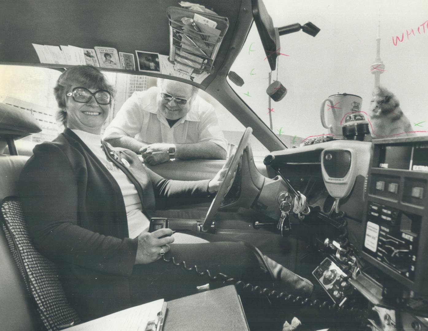 What's the basic attraction of driving a cab? 'Once we cover our expenses, we can do what we want', says Bob Signal, cabbie at the window of Nancy Coh(...)