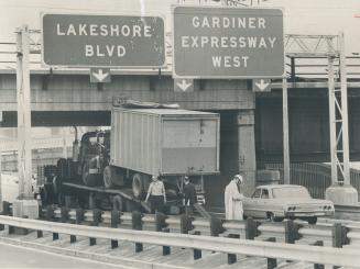 Just about 5 inches would have done it, the driver of this truck must have muttered to himself after trying to drive under the railway overpass near t(...)