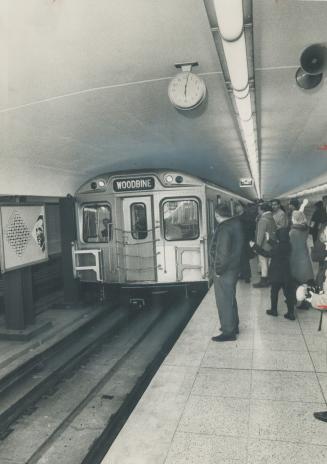 First west-bound train pulling into Woodbine Station