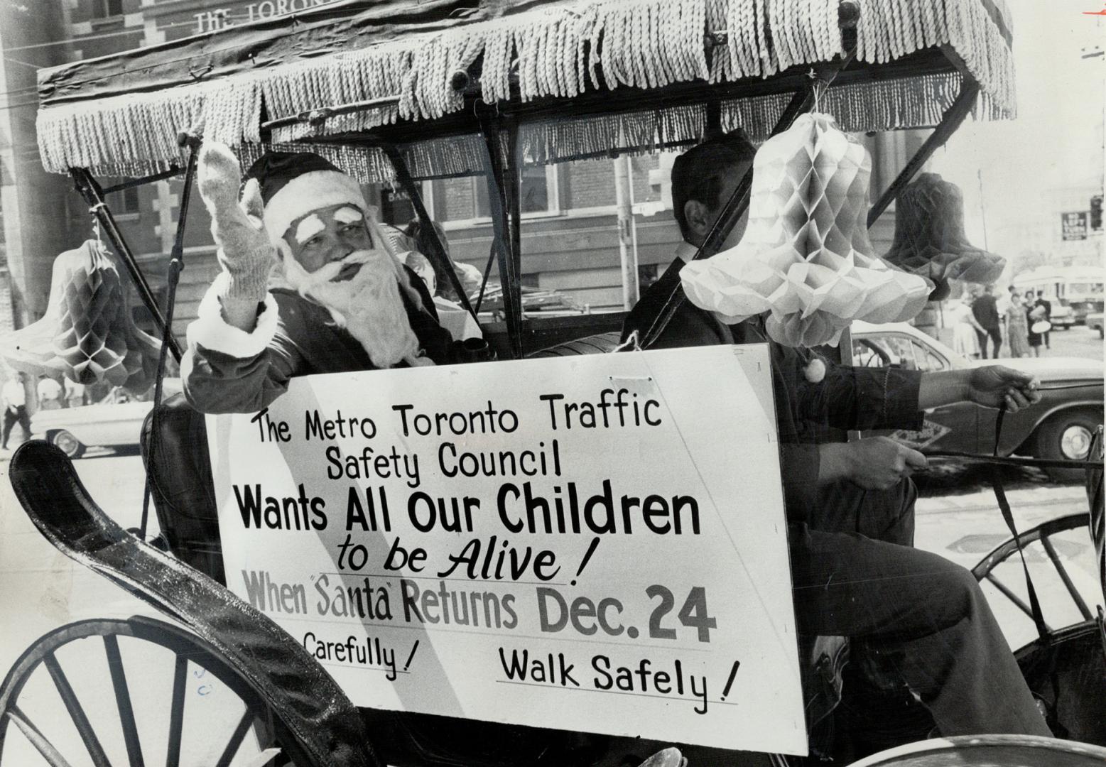 Santa out of season. A sweltering Santa Claus braved the 85-above weather today to ride up Bay St. in a surrey five months before he is usualy expecte(...)