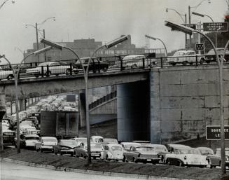 Traffic is jammed on Gardiner Expressway as more and more Lakeshore commuters spurn TTC and drive downtown