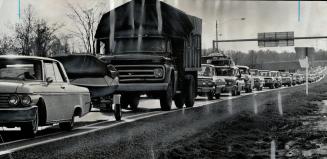 Goin nowhere fast for holiday. One of the worst hold-ups for those fleeing the city occured at Highway 401 and Kingston Rd. where the single-lane ramp(...)