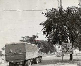 Truck drivers-at least some of them-have failed to notice these signs warning truck to keep off Lake Shore Blvd