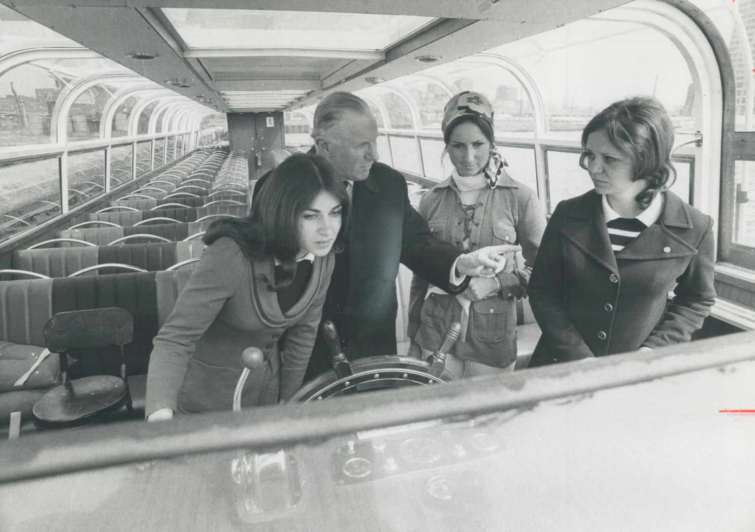 Image shows a group of people inside the boat during their training.