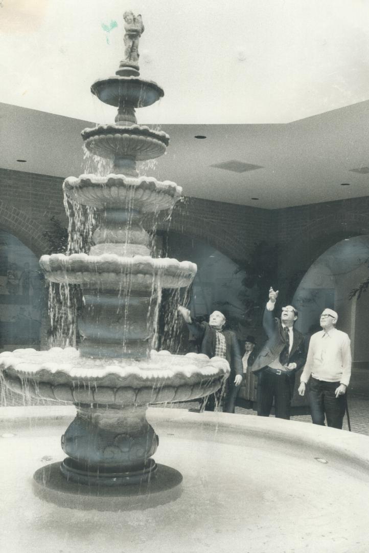 Three coins in the fountain. Tossing coins at the top of the fountain is popular with some of the 31 elderly Italians living at the new Villa Colombo (...)