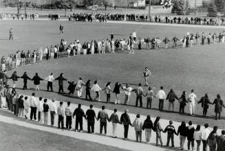 Hands Across Agincourt. About 1,500 students from Agincourt Collegiate institute and Agincourt Junior Public School took part in a Hands Across Aginco(...)