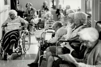 A silent group sits in the corridor of Kipling Aves