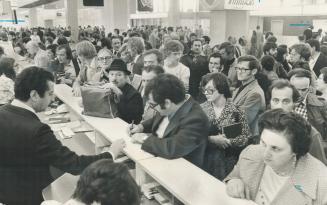 Free Flights to Italy: Hundred of anxious people lined ticket counters of Alitalia at Toronto International Airport during weekend to seek available seats on flights to Italy