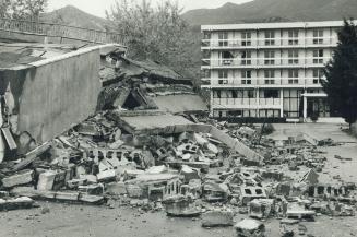 Level down hotel Montenegro in background still standing hotel Internacional in Budva