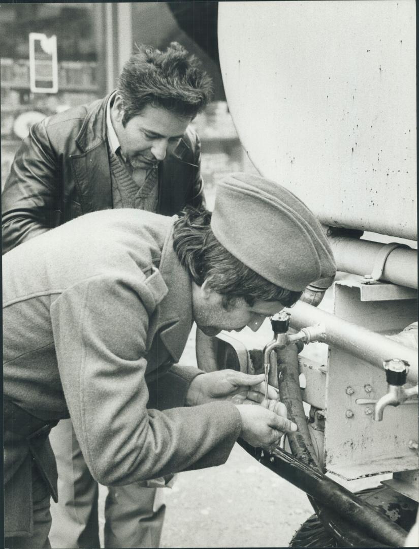 Civilion and Solder getting drinking water from truck cisteru in Budva