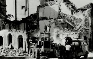 Ruins remain: Work crews are still clearing rubble in Sant' Angelo, further delaying the process of reconstruction following last year's earthquake