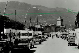 Homes in the street: Small trailers still line the streets of Sant' Angelo Dei Lombardi in southern Italy, almost a year after a killer earthquake devastated the region