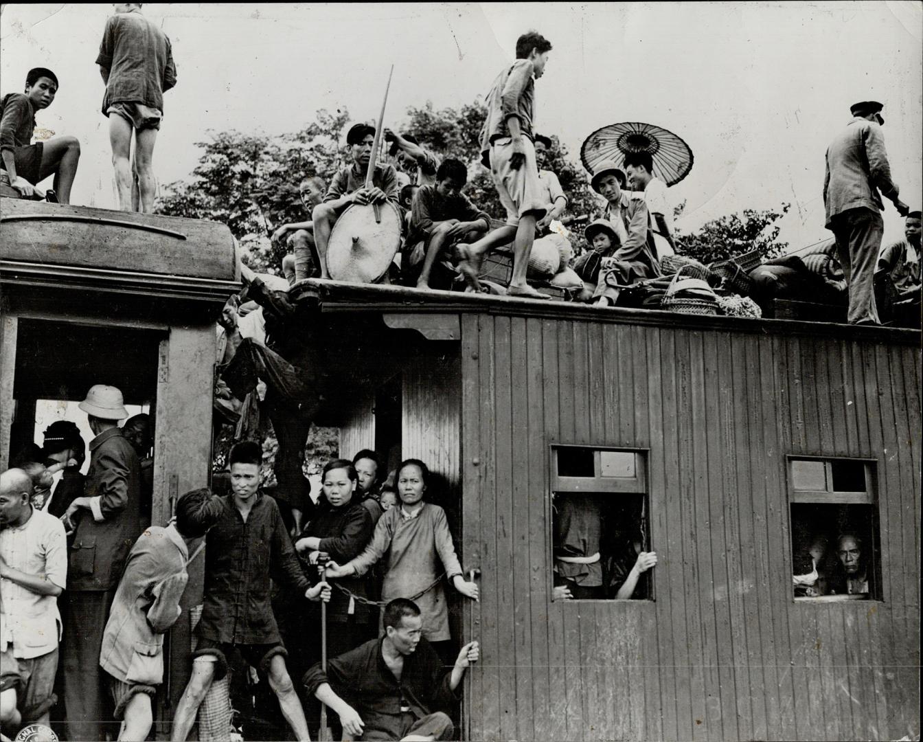 Evaculation trains like this have been a familiar feature in China during the recent Japanese advance which has compelled U.S. fliers to abandon airfield after airfield. [Incomplete]