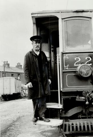 The electric train motorman awaits passengers for rural areas