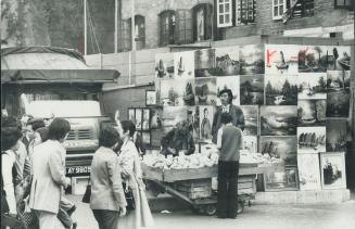 Hong Kong streets are a fascination in themselves, bustling, alive, bright with signs and stalls and stores and sometimes you'll find some strange mix(...)