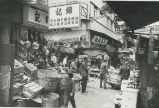 The crowded streets of Hong Kong are rich in sounds, sights, smells and human activity