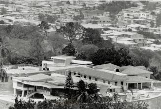 Disparity: Members of Haiti's small, rich elite live in mansions that look down on poverty-stricken Port-au-Prince