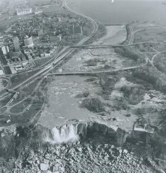 A Relative Trickle of water goes over the United States side of Niagara Falls yesterday after U