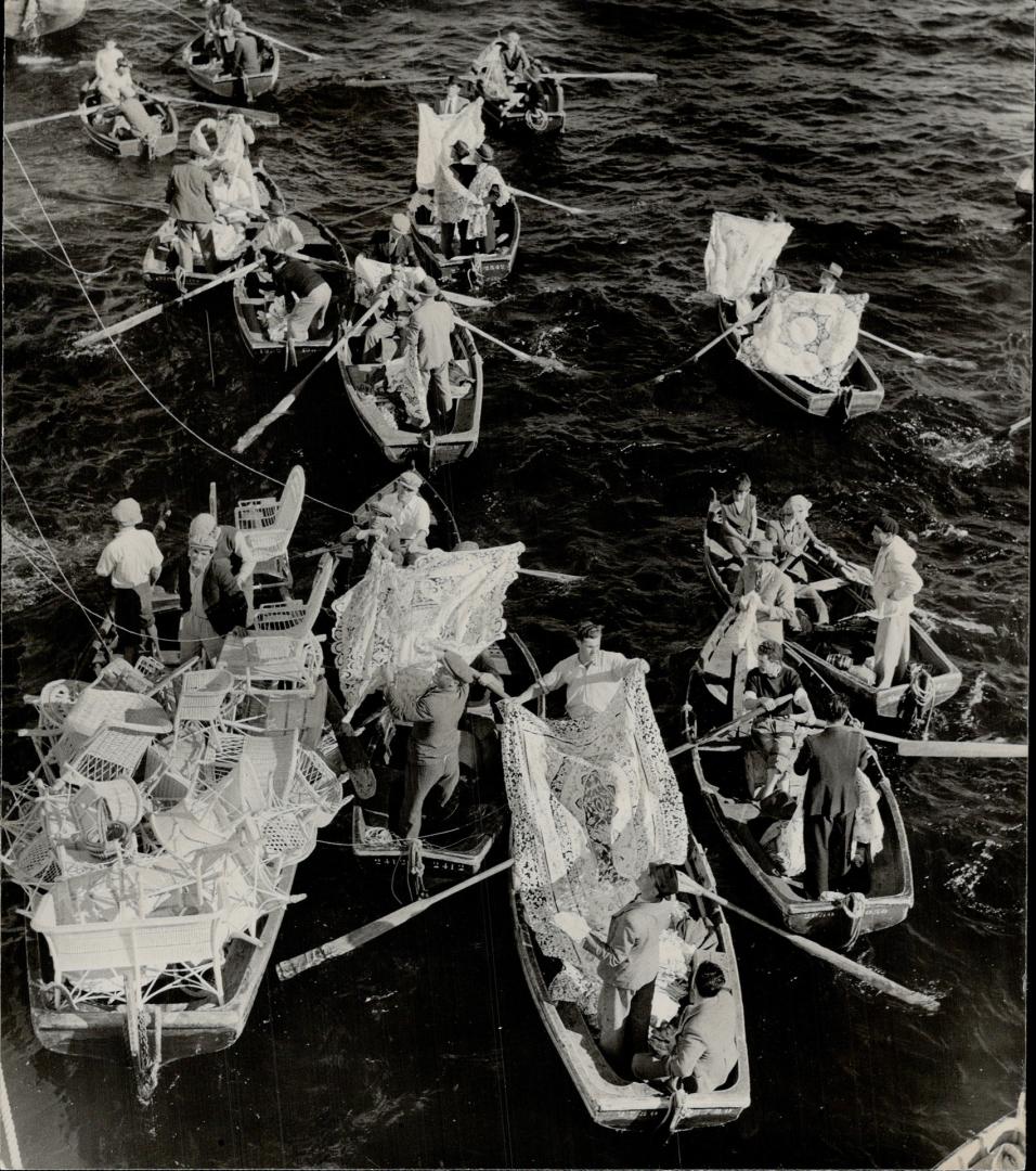 The market comes out to tourist-ship passengers in Madeira harbor