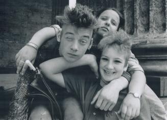 Soviet teenagers show the influence of punk rock in Leningrad's old Kazanski Cathedral square, where almost anything goes