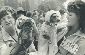 Marilyn Ebelthite of Mississauga with Charley Brown at left, Kathy Scott with Chi-Chi